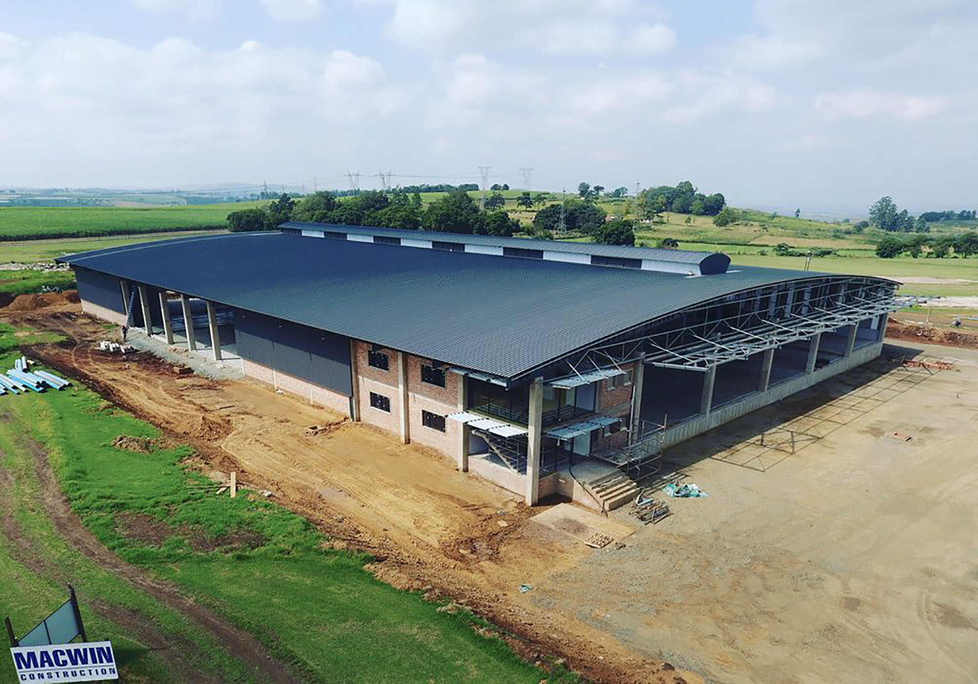 macwin-cover-pic-construction-company-landscape Bulk earthworks and complete construction of new 5000 square metre warehouse, A grade office space, external hardstands and all other infrastructural items such as storm water, sewer lines etc.
